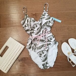 One piece sophisticated green and pink suit